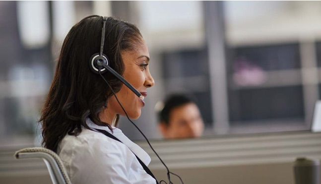 Call center worker with headset on